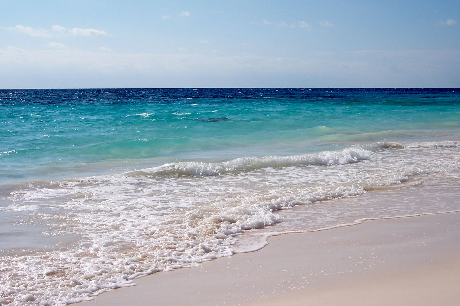 A pink-sand beach and turquoise water in Bermuda