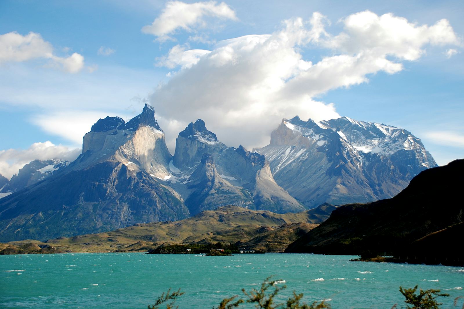 The peaks of Torres del Paine above a turquoise lake, Chile
