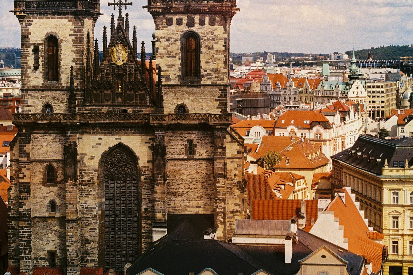 Gothic towers above Prague's Old Town rooftops, Czech Republic