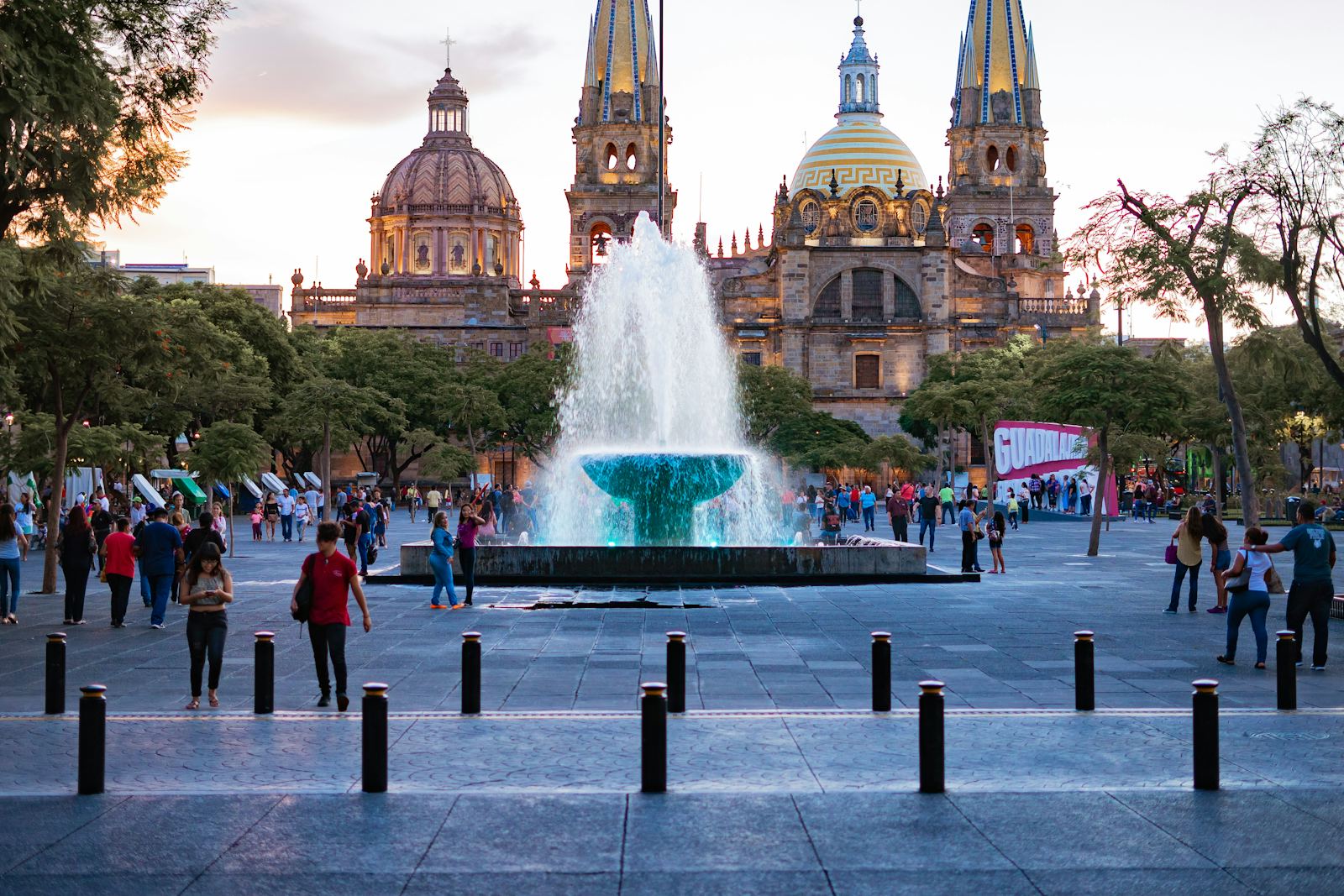 Guadalajara Cathedral and plaza fountain at golden hour, Mexico
