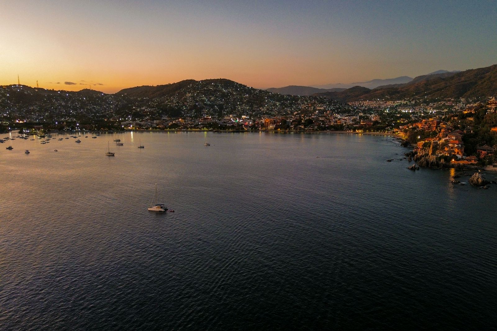 Zihuatanejo Bay with sailboats at sunset, Mexico