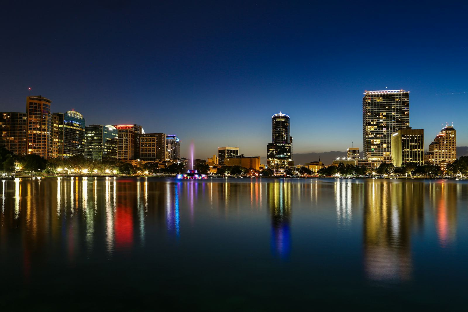 Downtown Orlando skyline reflected in Lake Eola at night