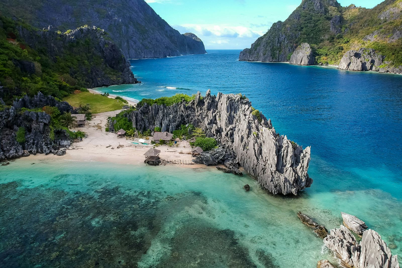 Karst cliffs and turquoise lagoon in El Nido, Palawan, Philippines