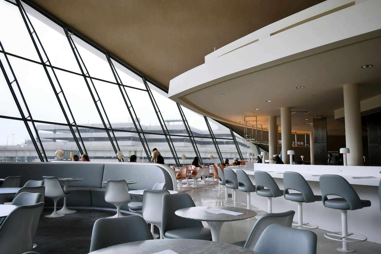 A calm, modern airport lounge